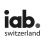 Black "iab." logo with a grey dot above the "i" and the word "switzerland" in lowercase beneath it, on a light grey background.